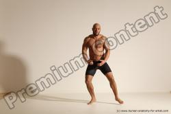 Underwear Gymnastic poses Man Black Muscular Bald Dancing Dynamic poses Academic